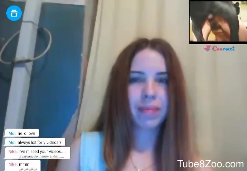 Shy webcam girl masturbates to zoophilic porn  